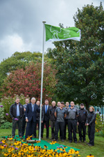 Green flag award team with flagpole 2